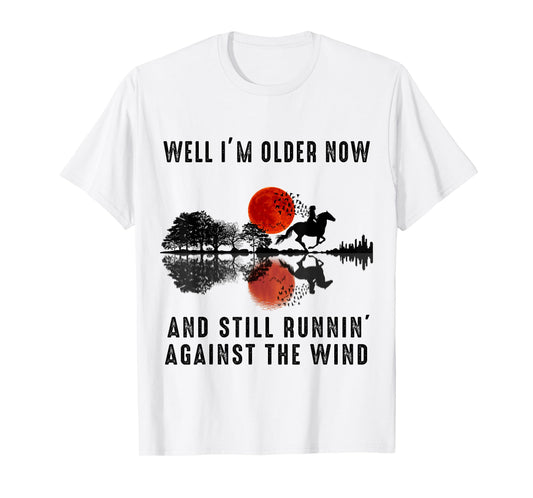 Well I’m Older Now But I’m Still Running Against The Wind T-Shirt